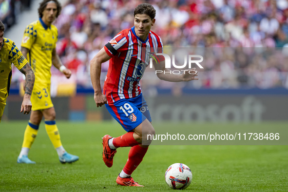 Julian Alvarez of Atletico de Madrid is in action with the ball during the La Liga EA Sports 2024/25 football match between Atletico de Madr...