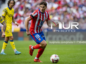 Julian Alvarez of Atletico de Madrid is in action with the ball during the La Liga EA Sports 2024/25 football match between Atletico de Madr...