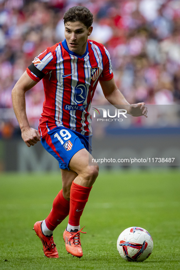 Julian Alvarez of Atletico de Madrid is in action with the ball during the La Liga EA Sports 2024/25 football match between Atletico de Madr...