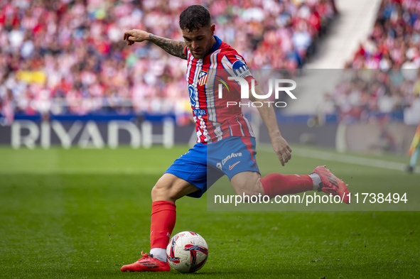 Javi Galan of Atletico de Madrid is in action with the ball during the La Liga EA Sports 2024/25 football match between Atletico de Madrid a...