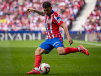 Javi Galan of Atletico de Madrid is in action with the ball during the La Liga EA Sports 2024/25 football match between Atletico de Madrid a...