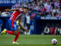 Nahuel Molina of Atletico de Madrid runs with the ball during the La Liga EA Sports 2024/25 football match between Atletico de Madrid and UD...