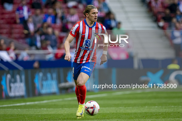 Conor Gallagher of Atletico de Madrid is in action with the ball during the La Liga EA Sports 2024/25 football match between Atletico de Mad...