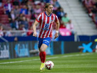 Conor Gallagher of Atletico de Madrid is in action with the ball during the La Liga EA Sports 2024/25 football match between Atletico de Mad...