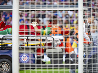 Jacobus Cillessen of UD Las Palmas leaves the field with a serious injury during the La Liga EA Sports 2024/25 football match between Atleti...