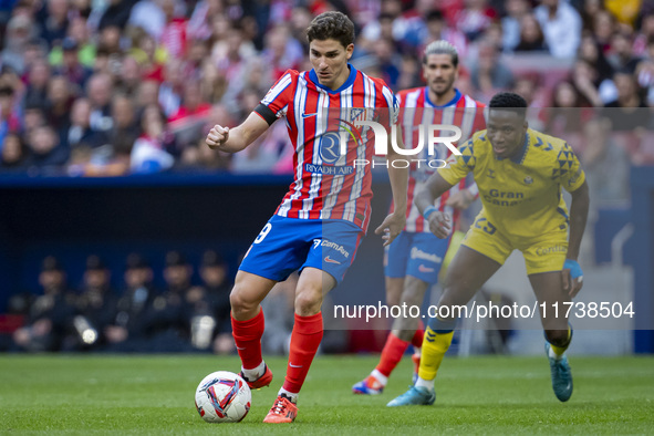 Julian Alvarez of Atletico de Madrid is in action with the ball during the La Liga EA Sports 2024/25 football match between Atletico de Madr...