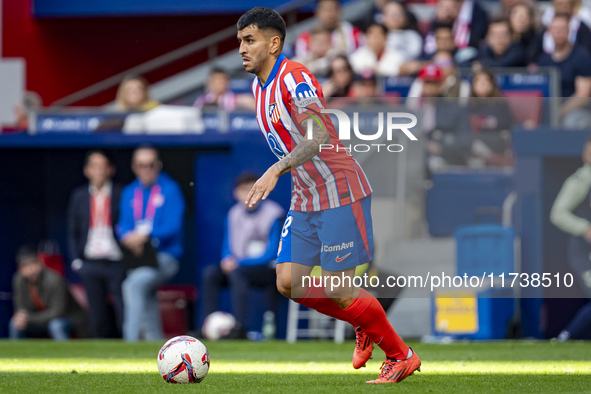 Angel Correa of Atletico de Madrid is in action with the ball during the La Liga EA Sports 2024/25 football match between Atletico de Madrid...