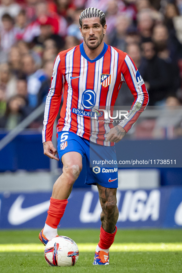 Rodrigo De Paul of Atletico de Madrid is in action with the ball during the La Liga EA Sports 2024/25 football match between Atletico de Mad...