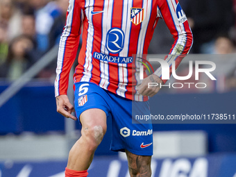 Rodrigo De Paul of Atletico de Madrid is in action with the ball during the La Liga EA Sports 2024/25 football match between Atletico de Mad...