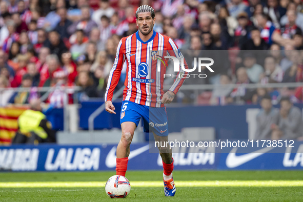 Rodrigo De Paul of Atletico de Madrid is in action with the ball during the La Liga EA Sports 2024/25 football match between Atletico de Mad...