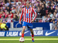 Rodrigo De Paul of Atletico de Madrid is in action with the ball during the La Liga EA Sports 2024/25 football match between Atletico de Mad...