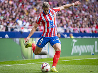 Conor Gallagher of Atletico de Madrid attempts a kick during the La Liga EA Sports 2024/25 football match between Atletico de Madrid and UD...