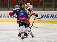 A hockey match between KS Cracovia 1906 (reds) and MMKS Podhale Nowy Targ (blues) takes place at the Adam 'Roch' Kowalski ice rink on the oc...