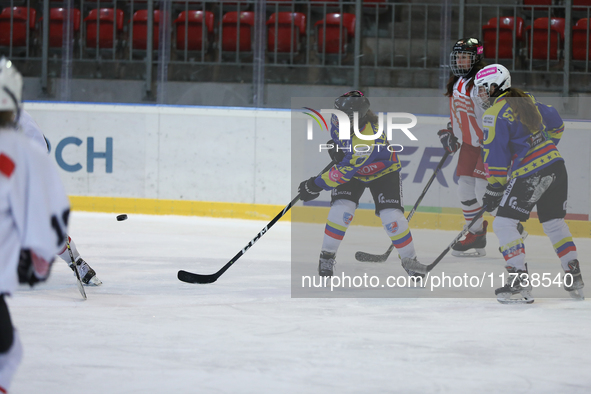 A hockey match between KS Cracovia 1906 (reds) and MMKS Podhale Nowy Targ (blues) takes place at the Adam 'Roch' Kowalski ice rink on the oc...