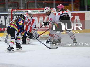 A hockey match between KS Cracovia 1906 (reds) and MMKS Podhale Nowy Targ (blues) takes place at the Adam 'Roch' Kowalski ice rink on the oc...