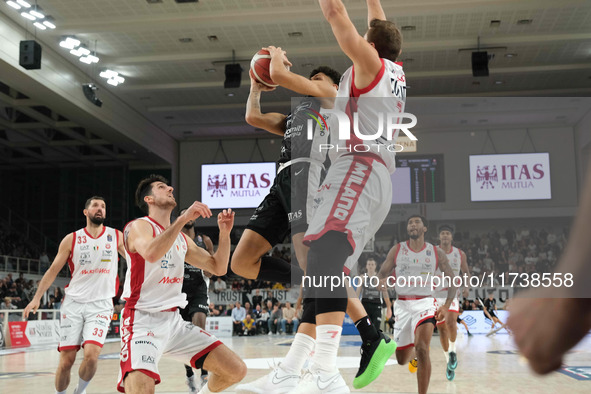 Quinn Ellis of Dolomiti Energia Trentino penetrates during the match between Dolomiti Energia Trentino and EA7 Emporio Armani Milano in the...