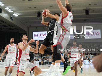 Quinn Ellis of Dolomiti Energia Trentino penetrates during the match between Dolomiti Energia Trentino and EA7 Emporio Armani Milano in the...