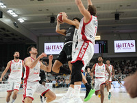 Quinn Ellis of Dolomiti Energia Trentino penetrates during the match between Dolomiti Energia Trentino and EA7 Emporio Armani Milano in the...