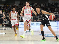 Quinn Ellis of Dolomiti Energia Trentino contrasts with Leandro Bolmaro of EA7 Emporio Armani Milano during the match between Dolomiti Energ...