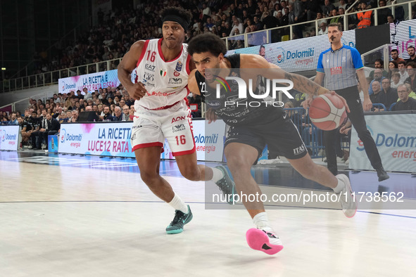 Anthony Lamb of Dolomiti Energia Trentino is followed by Zach Le Day of EA7 Emporio Armani Milano during the match between Dolomiti Energia...