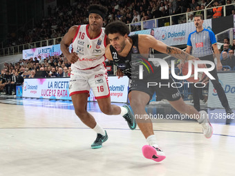 Anthony Lamb of Dolomiti Energia Trentino is followed by Zach Le Day of EA7 Emporio Armani Milano during the match between Dolomiti Energia...