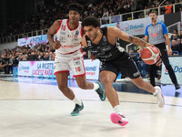 Anthony Lamb of Dolomiti Energia Trentino is followed by Zach Le Day of EA7 Emporio Armani Milano during the match between Dolomiti Energia...