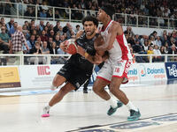 Anthony Lamb of Dolomiti Energia Trentino contrasts with Zach Le Day of EA7 Emporio Armani Milano during the match between Dolomiti Energia...