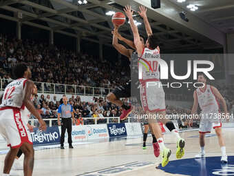 Selom Mawugbe of Dolomiti Energia Trentino takes a suspension shot during the match between Dolomiti Energia Trentino and EA7 Emporio Armani...