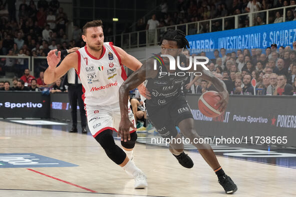 Myles Cale of Dolomiti Energia Trentino carries the ball during the match between Dolomiti Energia Trentino and EA7 Emporio Armani Milano in...