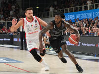 Myles Cale of Dolomiti Energia Trentino carries the ball during the match between Dolomiti Energia Trentino and EA7 Emporio Armani Milano in...