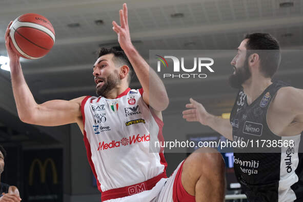 Giampaolo Ricci of EA7 Emporio Armani Milano takes the rebound during the match between Dolomiti Energia Trentino and EA7 Emporio Armani Mil...