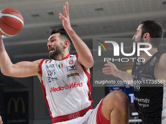 Giampaolo Ricci of EA7 Emporio Armani Milano takes the rebound during the match between Dolomiti Energia Trentino and EA7 Emporio Armani Mil...