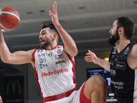 Giampaolo Ricci of EA7 Emporio Armani Milano takes the rebound during the match between Dolomiti Energia Trentino and EA7 Emporio Armani Mil...