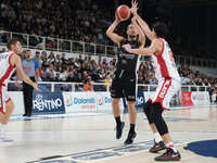 Toto Forray of Dolomiti Energia Trentino is in action during the match between Dolomiti Energia Trentino and EA7 Emporio Armani Milano in th...