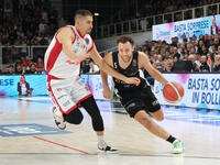 Jordan Ford of Dolomiti Energia Trentino contrasts with Diego Flaccadori of EA7 Emporio Armani Milano during the match between Dolomiti Ener...