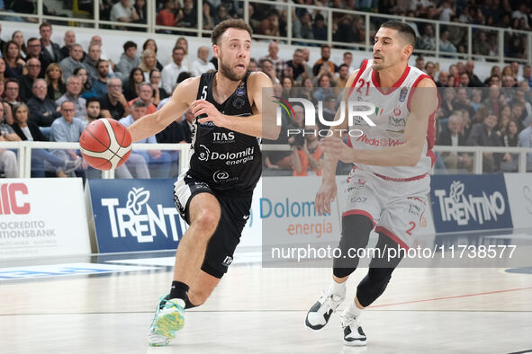 Jordan Ford of Dolomiti Energia Trentino is in action followed by Diego Flaccadori of EA7 Emporio Armani Milano during the match between Dol...