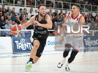 Jordan Ford of Dolomiti Energia Trentino is in action followed by Diego Flaccadori of EA7 Emporio Armani Milano during the match between Dol...