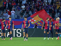 FC Barcelona players celebrate during the match between FC Barcelona and RCD Espanyol, corresponding to week 12 of LaLiga EA Sports, at the...