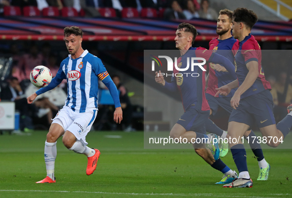 Javi Puado, Inigo Martinez, Marc Casado, and Hector Font play during the match between FC Barcelona and RCD Espanyol, corresponding to week...