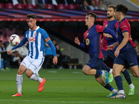 Javi Puado, Inigo Martinez, Marc Casado, and Hector Font play during the match between FC Barcelona and RCD Espanyol, corresponding to week...