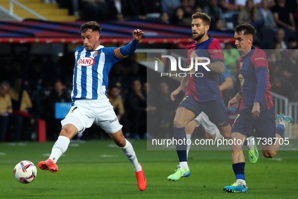 Javi Puado, Inigo Martinez, and Marc Casado play during the match between FC Barcelona and RCD Espanyol, corresponding to week 12 of LaLiga...