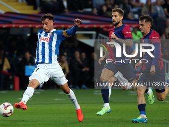 Javi Puado, Inigo Martinez, and Marc Casado play during the match between FC Barcelona and RCD Espanyol, corresponding to week 12 of LaLiga...