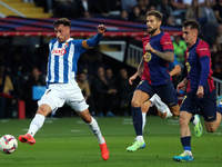 Javi Puado, Inigo Martinez, and Marc Casado play during the match between FC Barcelona and RCD Espanyol, corresponding to week 12 of LaLiga...