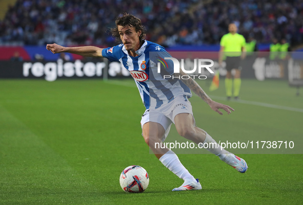 Carlos Romero plays during the match between FC Barcelona and RCD Espanyol, corresponding to week 12 of LaLiga EA Sports, at the Lluis Compa...