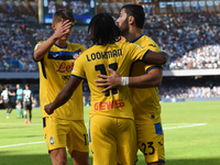 Ademola Lookman of Atalanta BC celebrates with team mates after scoring during the Serie A match between SSC Napoli and Atalanta BC at Stadi...