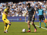 Davide Zappacosta of Atalanta BC competes for the ball with Khvicha Kvaratskhelia of SSC Napoli during the Serie A match between SSC Napoli...