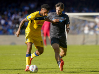 Ederson of Atalanta BC competes for the ball with Khvicha Kvaratskhelia of SSC Napoli during the Serie A match between SSC Napoli and Atalan...