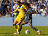 Lazar Samardzic of Atalanta BC competes for the ball with David Neres of SSC Napoli during the Serie A match between SSC Napoli and Atalanta...