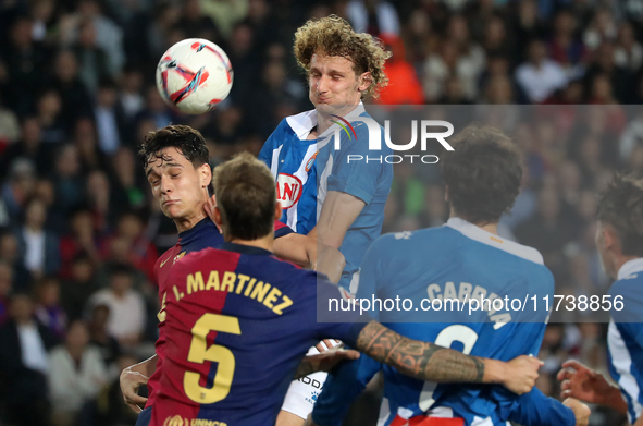 Alex Kral and Hector Font play during the match between FC Barcelona and RCD Espanyol, corresponding to week 12 of LaLiga EA Sports, at the...