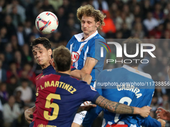 Alex Kral and Hector Font play during the match between FC Barcelona and RCD Espanyol, corresponding to week 12 of LaLiga EA Sports, at the...